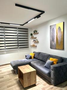 Predel za sedenje v nastanitvi Apartman Lux-besplatno korišćenje zasebne garaže