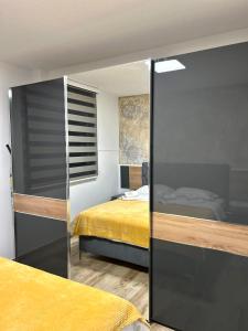 Postelja oz. postelje v sobi nastanitve Apartman Lux-besplatno korišćenje zasebne garaže