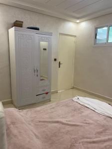 Una cama o camas en una habitación de Appartement à louer 80 m² à Aourir - agadir