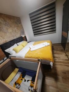 Postelja oz. postelje v sobi nastanitve Apartman Lux-besplatno korišćenje zasebne garaže