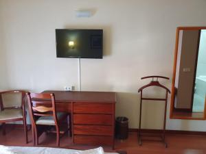 TV a/nebo společenská místnost v ubytování Hotel Peninsular