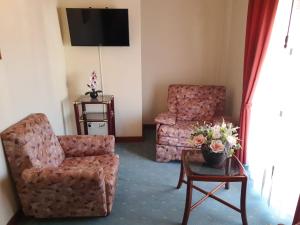 Posezení v ubytování Hotel Peninsular
