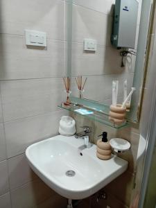 Kupatilo u objektu NINA 3 AKVA PARK adr Stevana Ivanovica 1