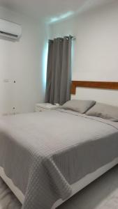 Postel nebo postele na pokoji v ubytování Hermoso & Espectacular Apartamento Con La Mejor Vista De Santiago