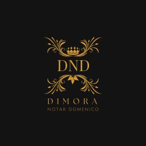 普利亞區格拉維納的住宿－Dimora Notar Domenico -GRAVINA IN PUGLIA-，黑色背景上的金冠标志