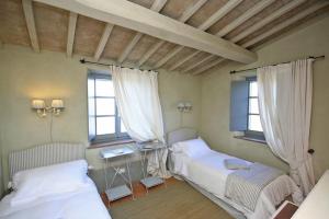 Posteľ alebo postele v izbe v ubytovaní Villa Danilo by PosarelliVillas