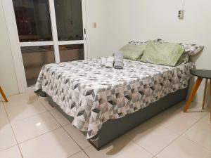 Postel nebo postele na pokoji v ubytování Central APTO Santa Cruz do Sul