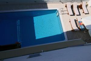 an overhead view of a swimming pool at Erato Hotel in Agia Marina Aegina