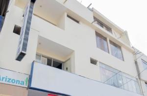 a tie hanging off the side of a building at Hotel Arizona Piura in Piura