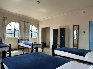 Una cama o camas en una habitación de Hostal Andaina