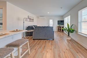 a living room with a couch and a table at Cozy Escape with Modern Comfort in Central Auburn - 1BD, 1BA Apartment in Auburn