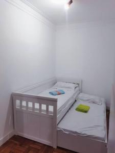 Cama o camas de una habitación en Super aconchegante Bem localizado, prox Ibirapuera