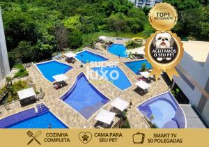 Výhľad na bazén v ubytovaní Flat Super Luxo - Rio Quente - Acesso Ao Rio alebo v jeho blízkosti