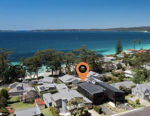 an aerial view of a suburb with an orange marker at Hyams Beach House A - Brand new lux beach Oasis in Hyams Beach