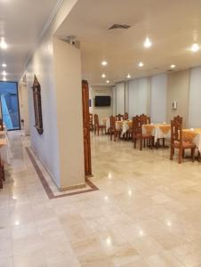 TV a/nebo společenská místnost v ubytování Hotel Alcala del Rio
