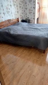 Postel nebo postele na pokoji v ubytování Guest House Borjomi