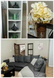 uma sala de estar com um sofá e um vaso de flores em Pamuzinda Airbnb at Urban Cove em Nelspruit