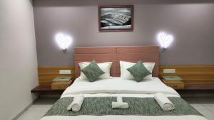 Katil atau katil-katil dalam bilik di HOTEL AURELLIA