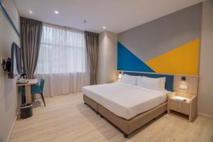 Ένα ή περισσότερα κρεβάτια σε δωμάτιο στο Fives Hotel Meldrum