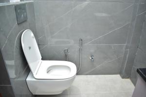 Koupelna v ubytování Qotel Hotel Signature BNB-Ashok Vihar