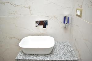 Koupelna v ubytování Qotel Hotel Signature BNB-Ashok Vihar
