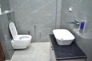 Koupelna v ubytování Qotel Hotel Signature BNB-Ashok Vihar