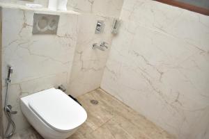 Koupelna v ubytování Qotel Hotel Signature BNB-Ashok Vihar