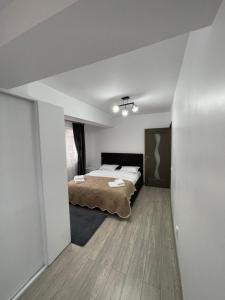 Ένα ή περισσότερα κρεβάτια σε δωμάτιο στο Traveler’s Home
