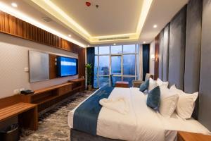 TV a/nebo společenská místnost v ubytování Paradise Inn Jeddah Hotel