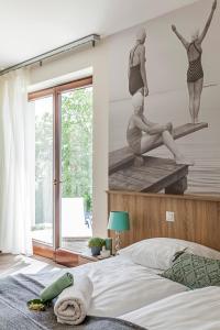 Posteľ alebo postele v izbe v ubytovaní Pilger Apartments
