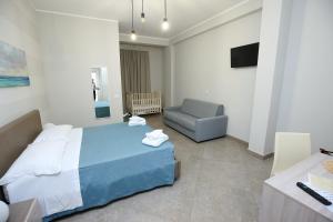Letto o letti in una camera di Sand Hotel