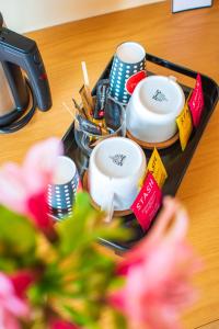 Set per la preparazione di tè e caffè presso Hótel Laugar