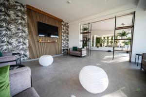 TV a/nebo společenská místnost v ubytování New River Hotel