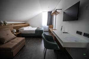 TV a/nebo společenská místnost v ubytování New River Hotel