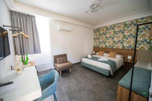 Postel nebo postele na pokoji v ubytování New River Hotel