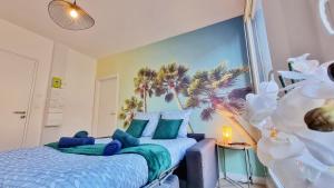 Posteľ alebo postele v izbe v ubytovaní La Résidence Évasion 2 - Original - Gare - Wifi - Relax BNB