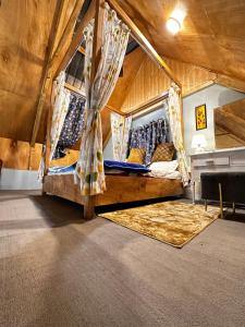 a room with two bunk beds in a house at The Forest Way Loft by YEMBERZAL in Srinagar