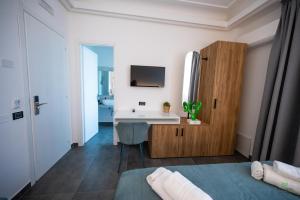 TV a/nebo společenská místnost v ubytování New River Hotel