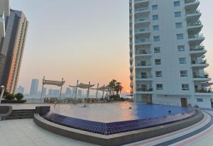 A piscina em ou perto de CozyCorner - Gym & Pool Access - Reem Island