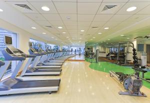 O centro de fitness e/ou as comodidades de fitness de CozyCorner - Gym & Pool Access - Reem Island