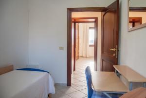 Postel nebo postele na pokoji v ubytování Casa Maddalena
