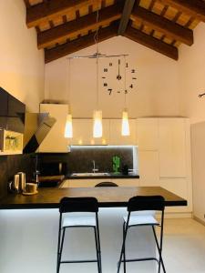 Kjøkken eller kjøkkenkrok på Benvenuti in Casa Peluca!