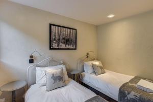 Posteľ alebo postele v izbe v ubytovaní Chalet d'Olivier - Alpes Travel - Les Praz (Sleeps 8)