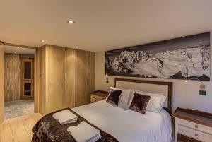 Posteľ alebo postele v izbe v ubytovaní Chalet d'Olivier - Alpes Travel - Les Praz (Sleeps 8)