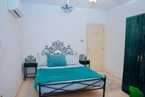 Postel nebo postele na pokoji v ubytování Tunis Oasis 4 Bedrooms private villa with private pool