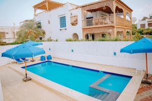Bazén v ubytování Tunis Oasis 4 Bedrooms private villa with private pool nebo v jeho okolí