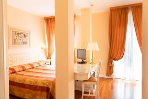 Katil atau katil-katil dalam bilik di Hotel Tuder