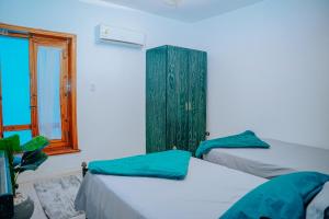 Postel nebo postele na pokoji v ubytování Tunis Oasis 4 Bedrooms private villa with private pool