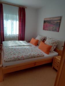 Postel nebo postele na pokoji v ubytování Ferienwohnung Mülli