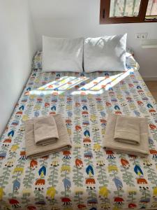 Posteľ alebo postele v izbe v ubytovaní Habitación González